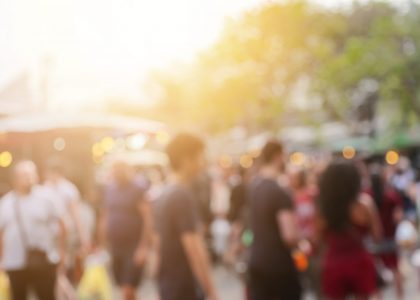 Blur of people and environment at weekend market background